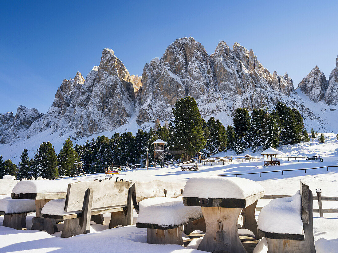 Geisler Mountain Range or Gruppo delle Odle Mountain Range in the valley of Villnoess in South Tyrol (alto adige) after a snowstorm in late fall. The Geisler Mtn. Range is part of the UNESCO world heritage dolomites. Europe, Central Europe, Italy, Novembe