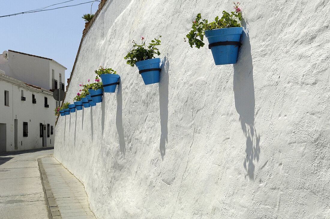 Blue Pots on a street in Mijas Malaga