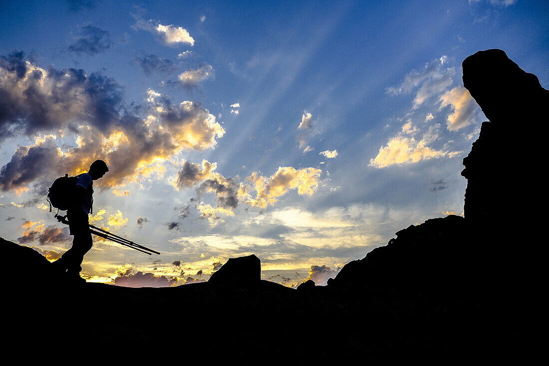 'Photographer silhouette at Monegros desertic area called ''La Cobeta'', Jubierre, Castejón de Monegros, Huesca, Aragón, Spain.'