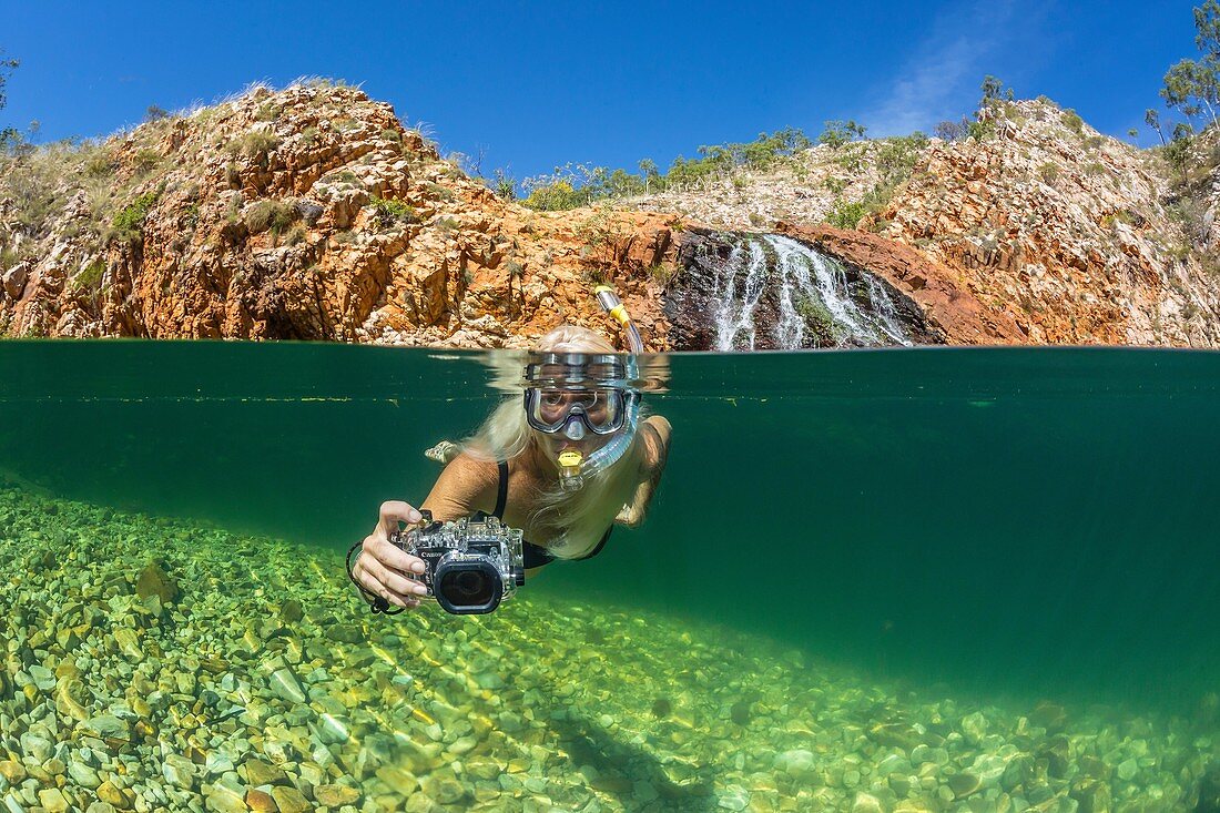 National Geographic Orion staff CT Ticknor enjoying a swim at Crocodile Creek, Yampi Bay, Kimberley, Western Australia, Australia.