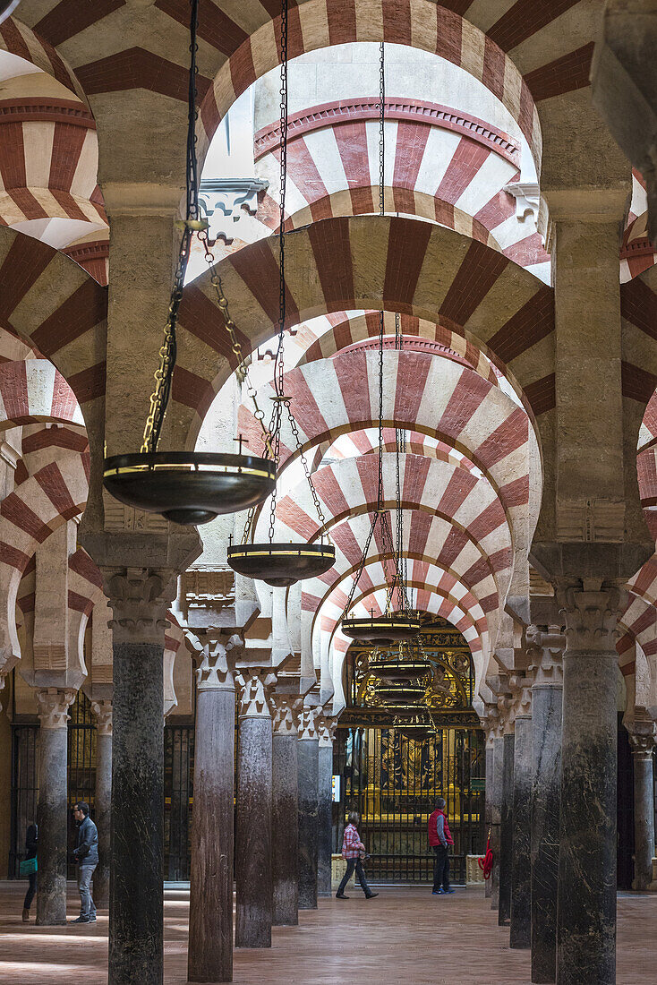 Pillars and arches in the Great Mosque, La Mezquita, Cordoba, Spain.
