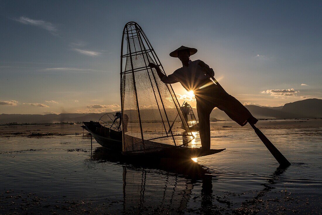 Fisherman on Inle Lake fishing, Myanmar.