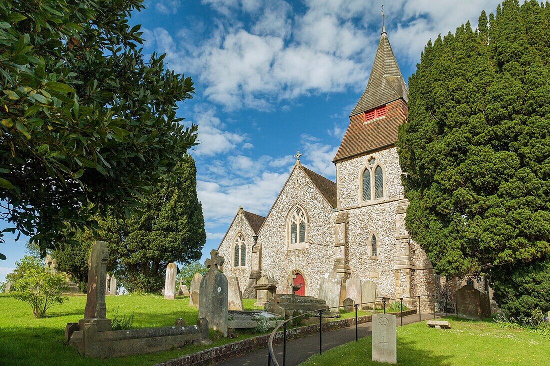 St Cosmas and St Damian church in the village of Keymer, West Sussex, England. South Downs National Park.