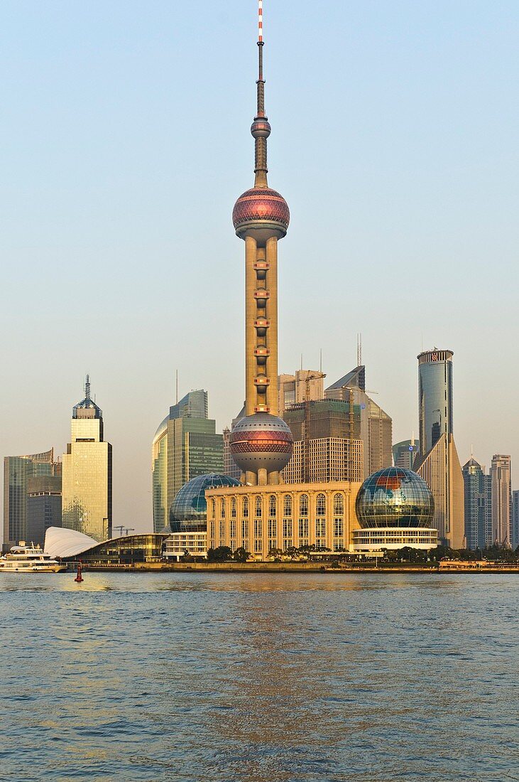 View of the ´Oriental Pearl TV Tower´, Pudong Business District Skyline from the ´Bund´ or ´Wai Tan´ and Huangpu River, Shanghai, China, Asia.
