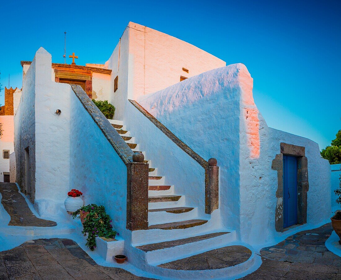 Chapel in the town of Chora on Patmos island in Greece. Patmos is a small Greek island in the Aegean Sea. One of the northernmost islands of the Dodecanese complex, it has a population of 2,998 and an area of 34. 05 km2 (13. 15 sq mi). The Municipality of