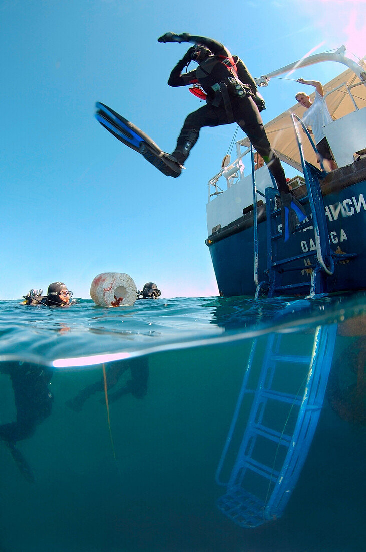 'Diver jumps into the water to survey the shipwreck of the Russian transport vessel ''Bryansk'', Odessa, Black Sea, Ukraine, Eastern Europe, Europe.'