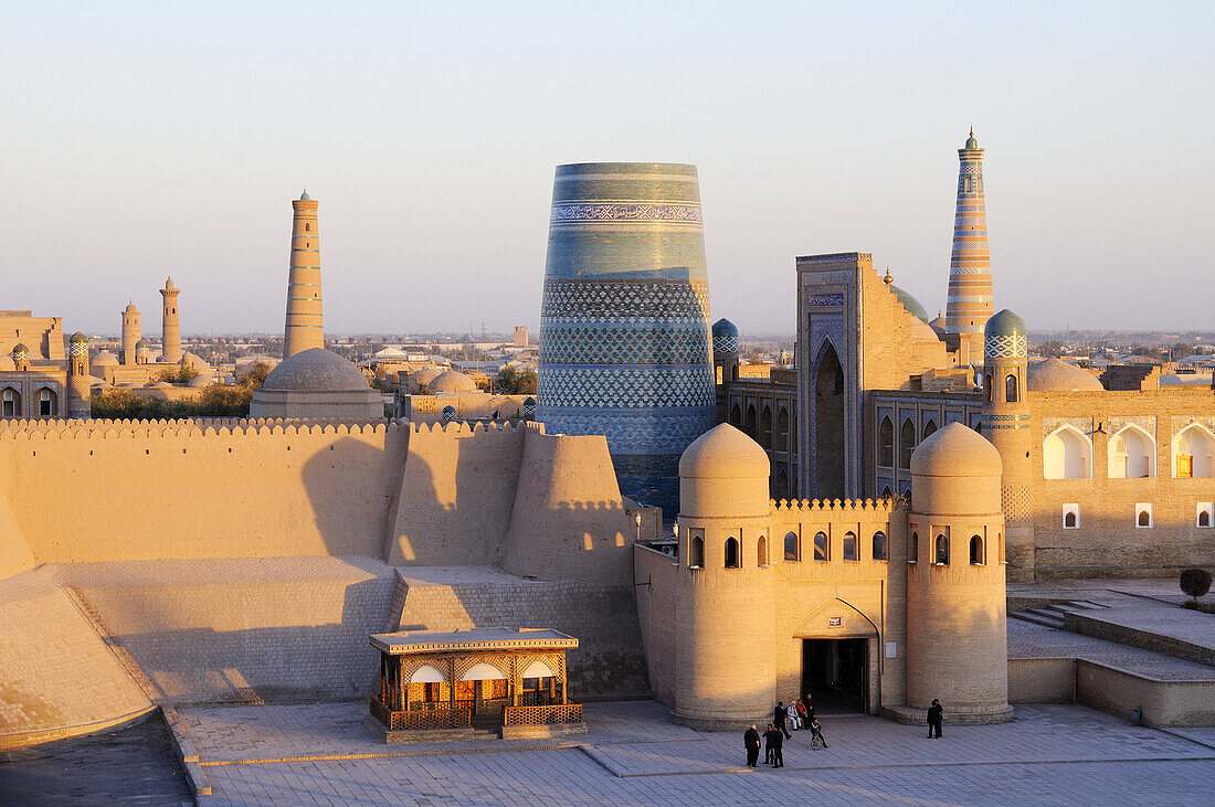 Walled city of Khiva viewed from the West Gate in the evening. Uzbekistan, Khorezm, Khiva, Itchan Kala (inner town).