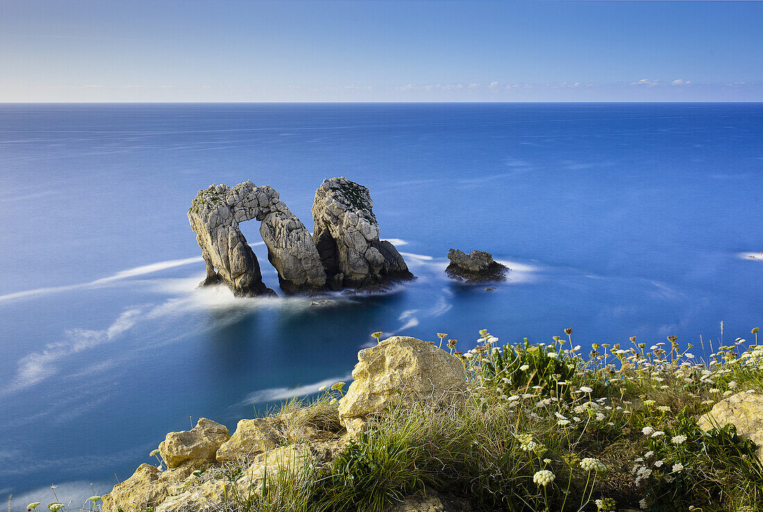 Dramatic arch in rocks Cantabria coast