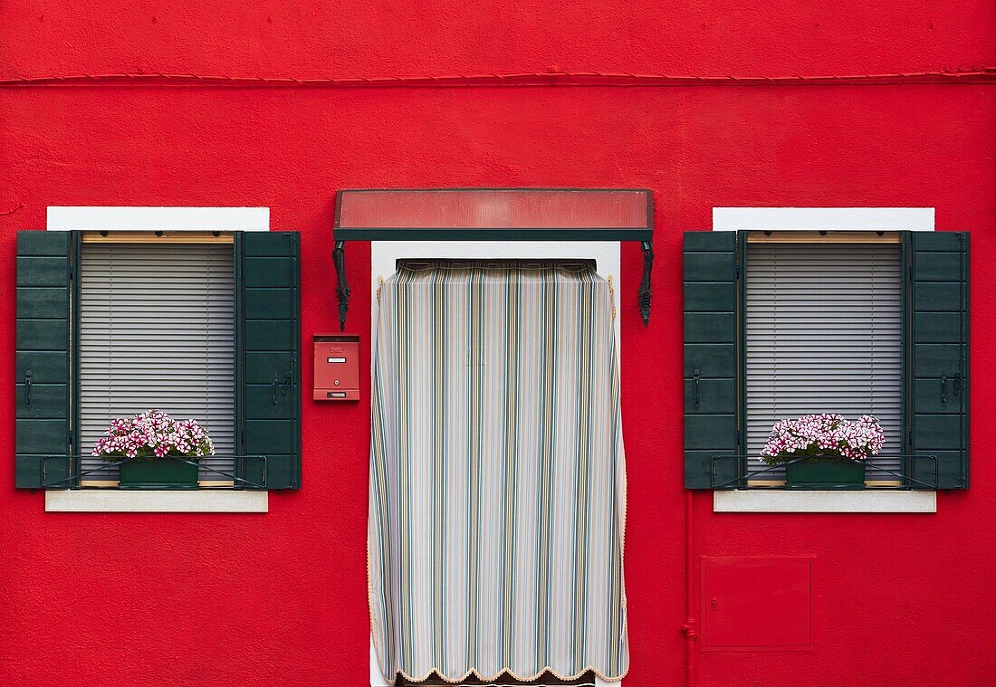 Red house, Burano, Venetian Lagoon, Veneto, Italy, Europe.