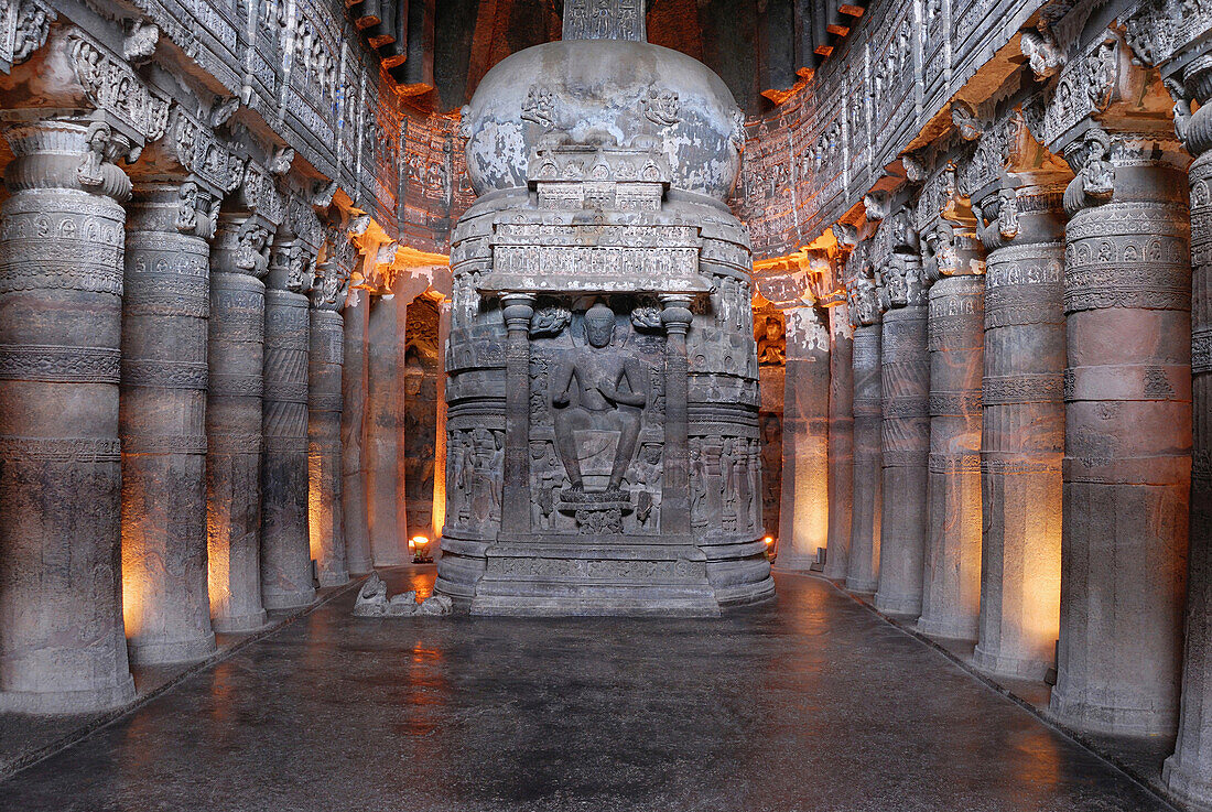 Cave 26: Stupa with Buddha seated on a lion throne with his feet resting on the lotus. Ajanta Caves, Aurangabad, Maharashtra, India.