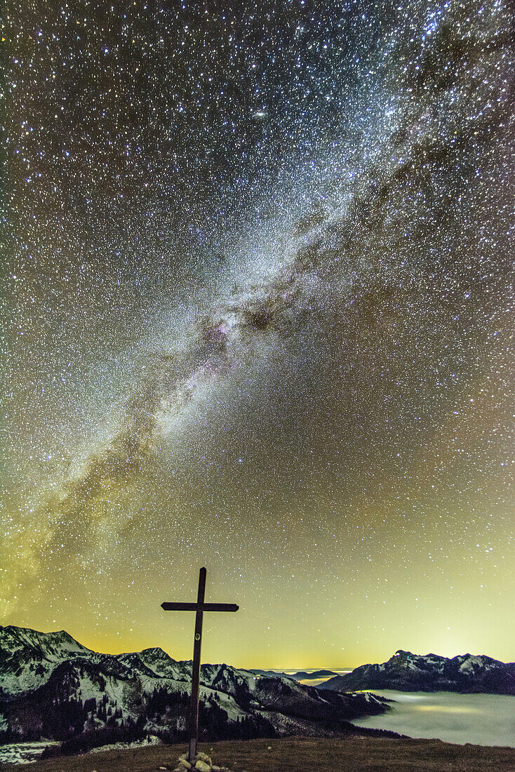 Starry sky with Milky Way above sea of fog with Mangfall range, Bruennsteinschanze, Mangfall range, Bavarian Alps, Upper Bavaria, Bavaria, Germany