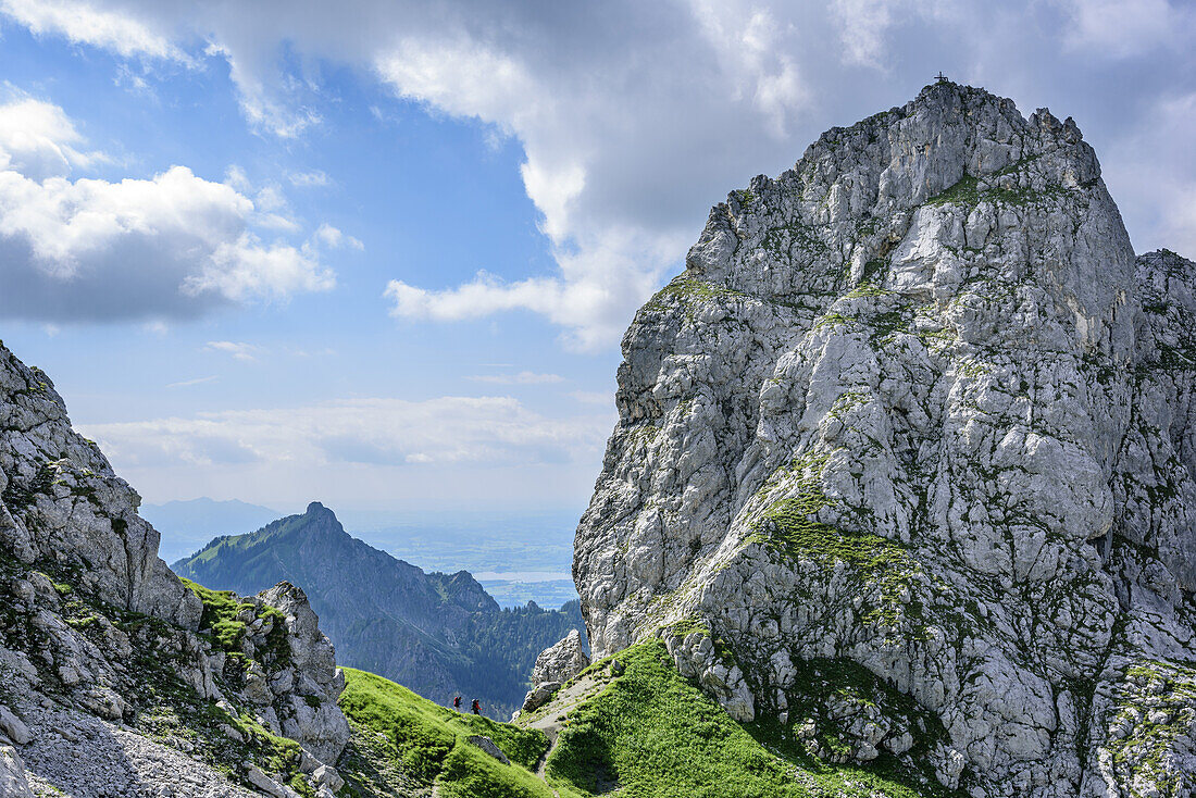 Two persons hiking at Gabelschrofensattel, Gabelschrofensattel, Ammergau Alps, East Allgaeu, Allgaeu, Swabia, Bavaria, Germany