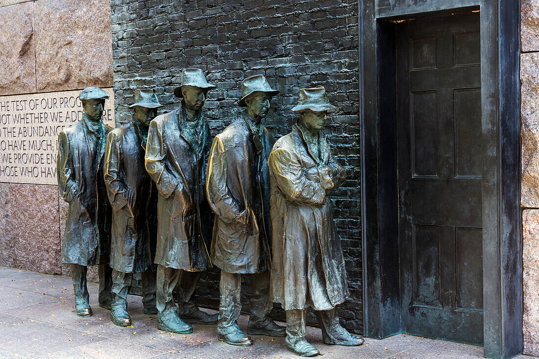 'Bronze statue depicting people waiting on a bread line during the Great Depression, Franklin Delano Roosevelt Memorial; Washington, District of Columbia, United States of America'