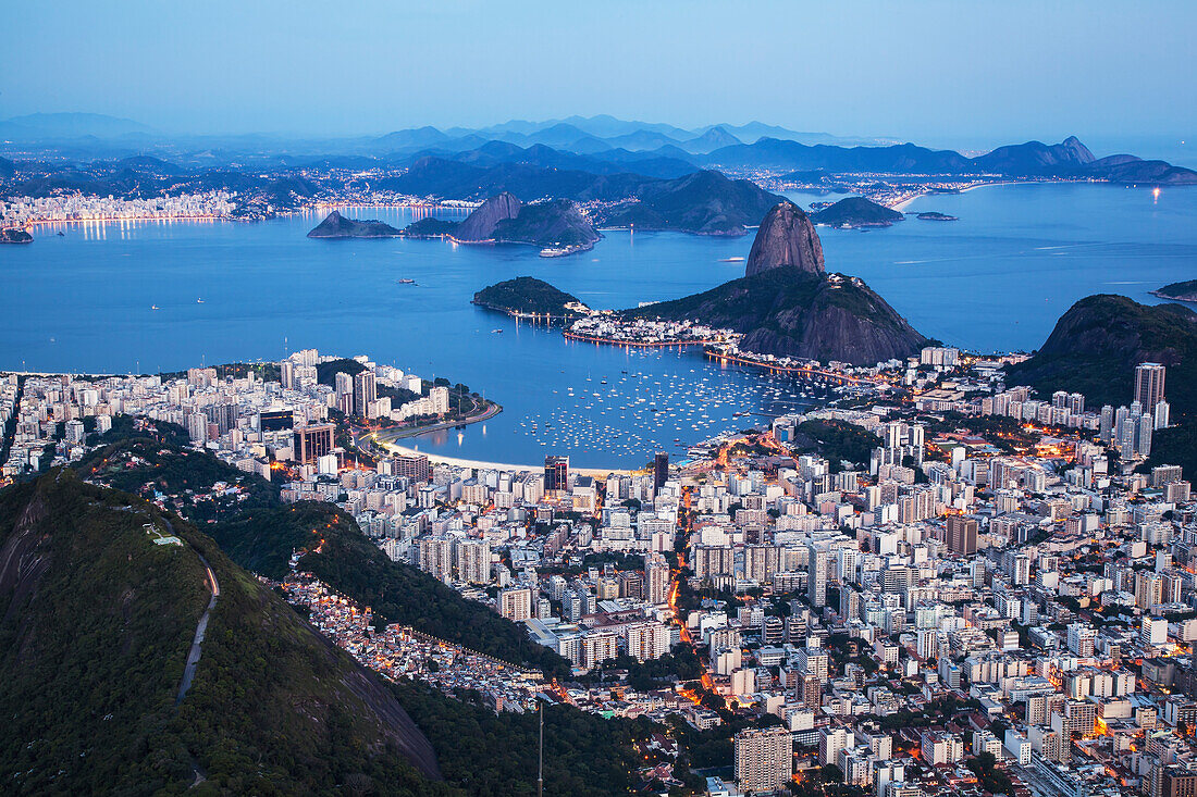 'Dusk falls on Rio de Janeiro as viewed from Corcovado; Rio de Janeiro, Brazil'