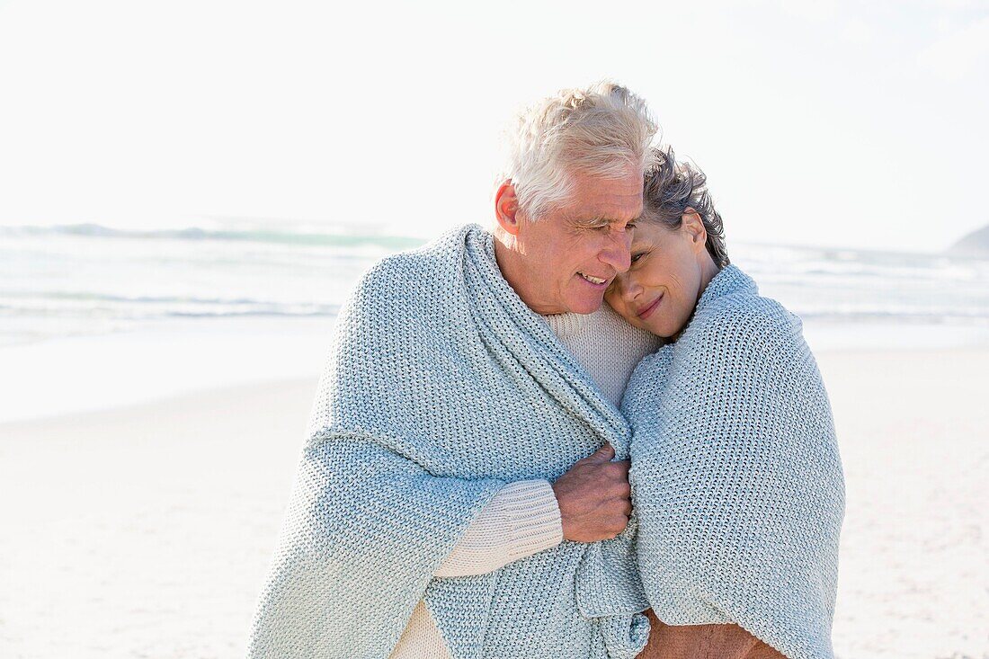 Couple embracing each other on the beach