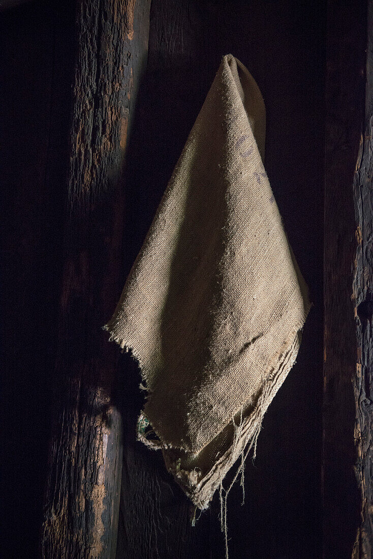 old sack hanging at wall at open air museum in Neuhausen ob Eck, Tuttlingen district, Swabian Alb, Baden-Wuerttemberg, Germany