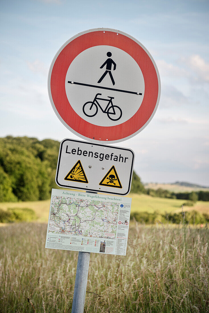 danger sign indicates danger of life when leaving the paths at former military area, Muensingen, Reutlingen district, Swabian Alb, Baden-Wuerttemberg, Germany