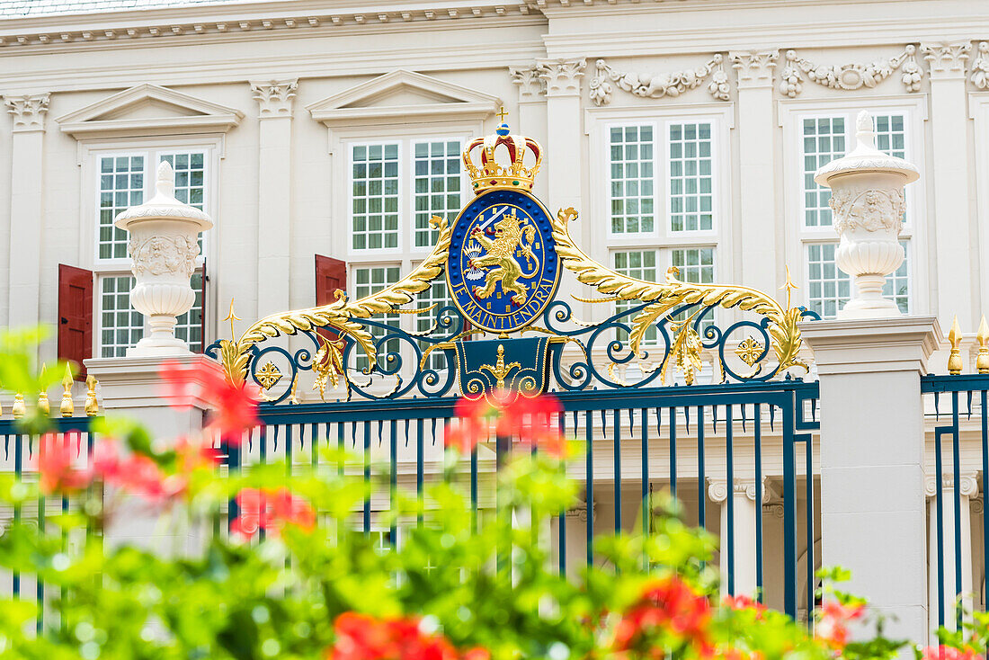 The coat of arms at the entrance to the king's palace Noordeinde of the Dutch royal family in the city centre, The Hague, Netherlands