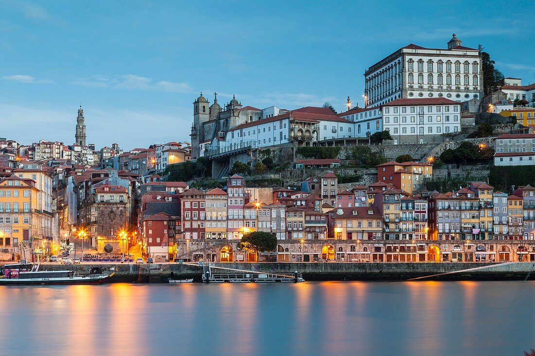 Sunrise at Ribeira, seen across Douro river, Porto, Portugal.