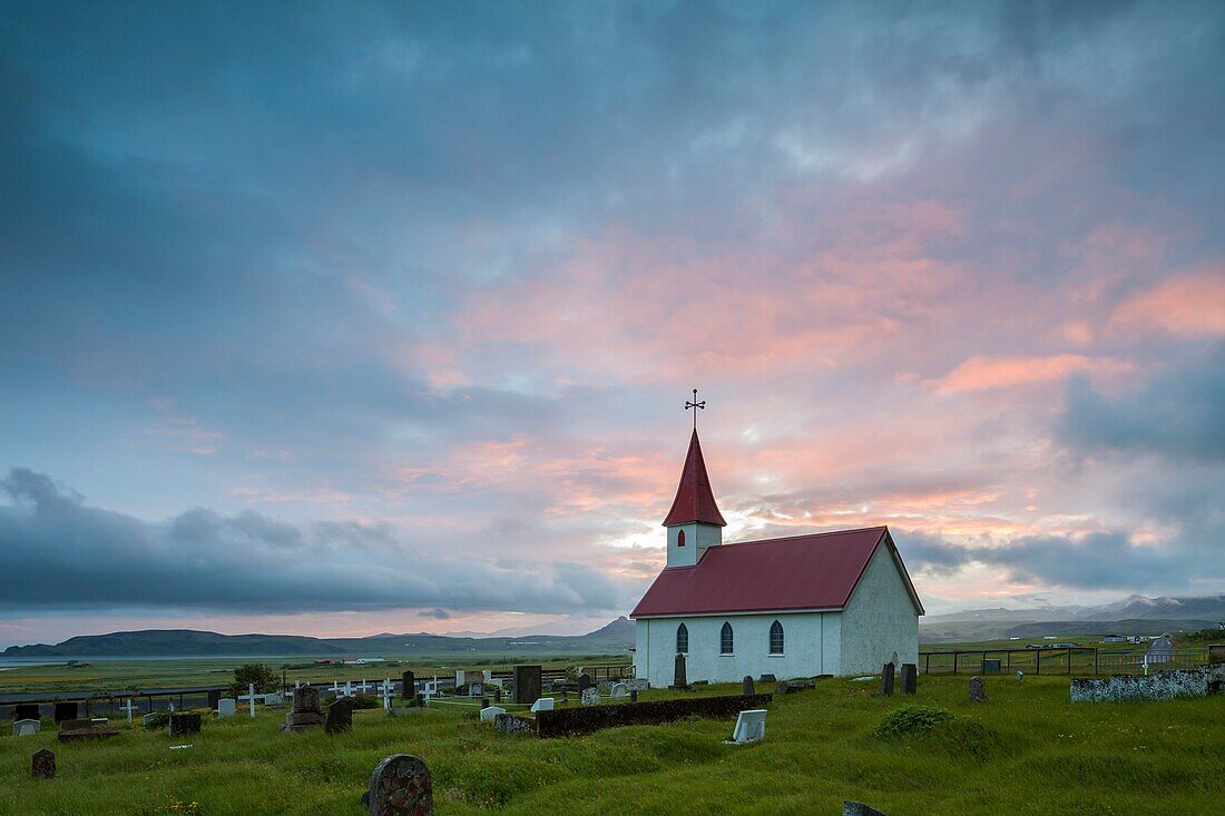Sunset at Reyniskirkja church near Vik, Iceland.