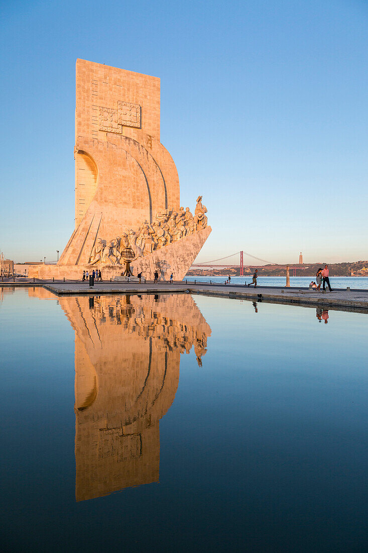 Sunset on the Padrao dos Descobrimentos (Monument to the Discoveries) reflected in Tagus River, Belem, Lisbon, Portugal, Europe