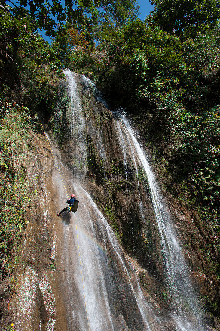 Canyoning in a waterfall in Nepal, Asia