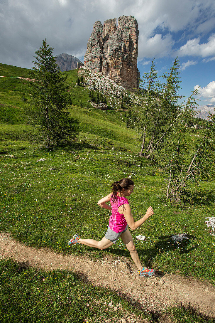 Trail running around the Cinque Torre in the famous and beautiful Dolomites