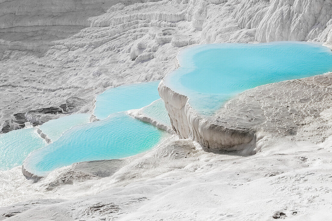 'Hot springs and travertines, terraces of carbonate minerals left by the flowing water; Pamukkale, Turkey'