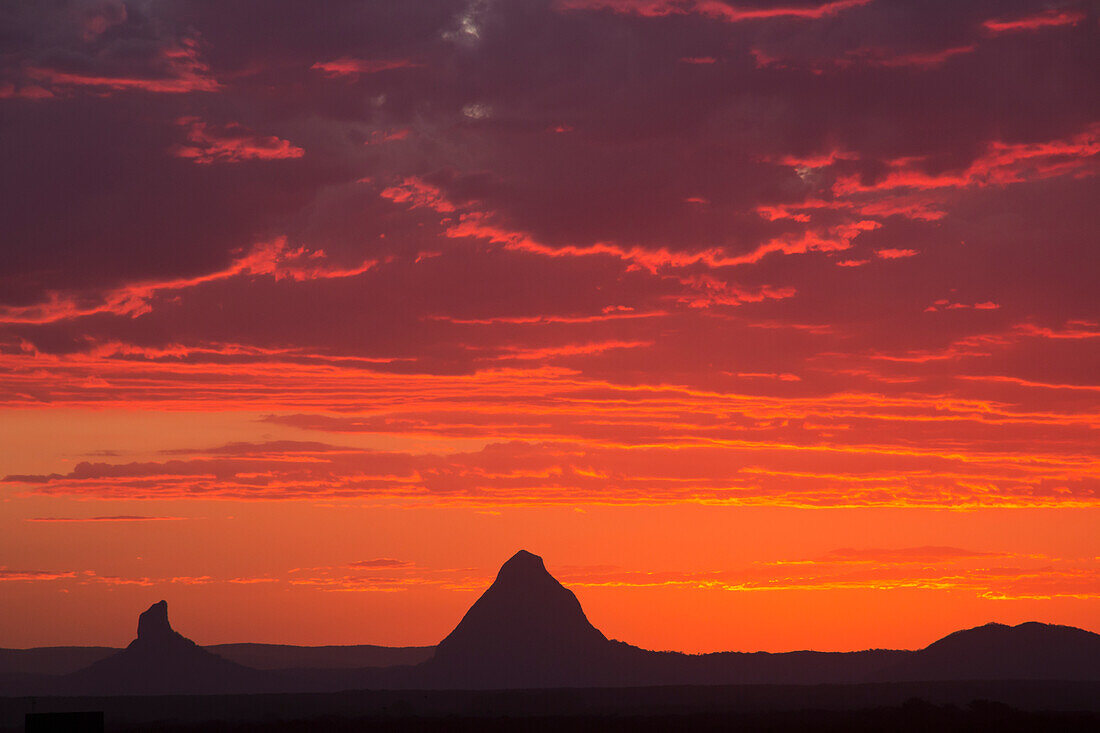 'Glass House Mountains with a dramatic sunrise; Queensland, Australia'