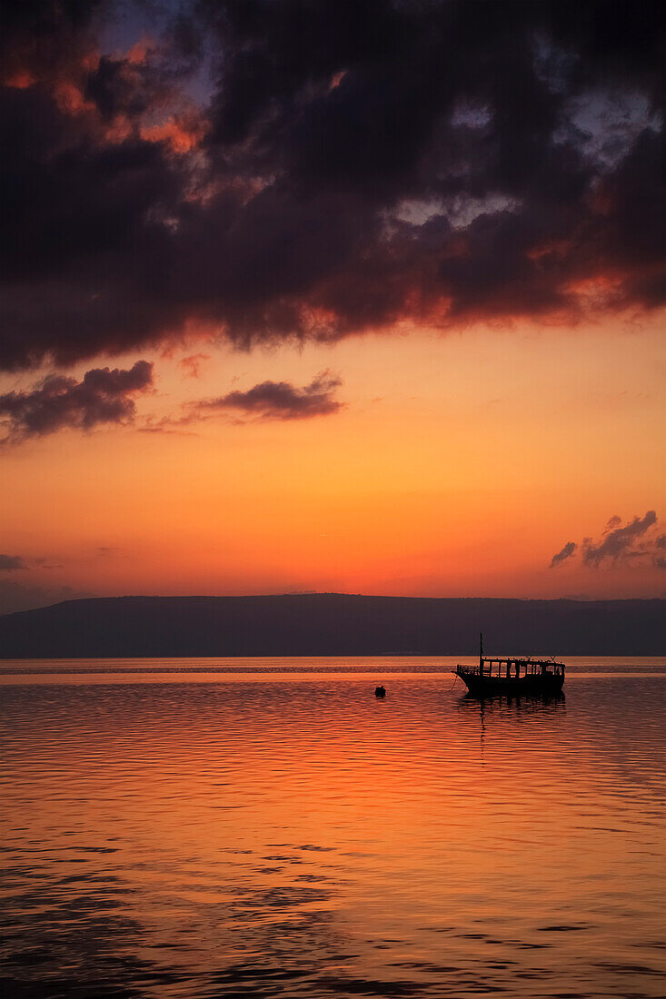 'A calm settles on the Sea of Galilee, just after a storm; Galilee, Israel'