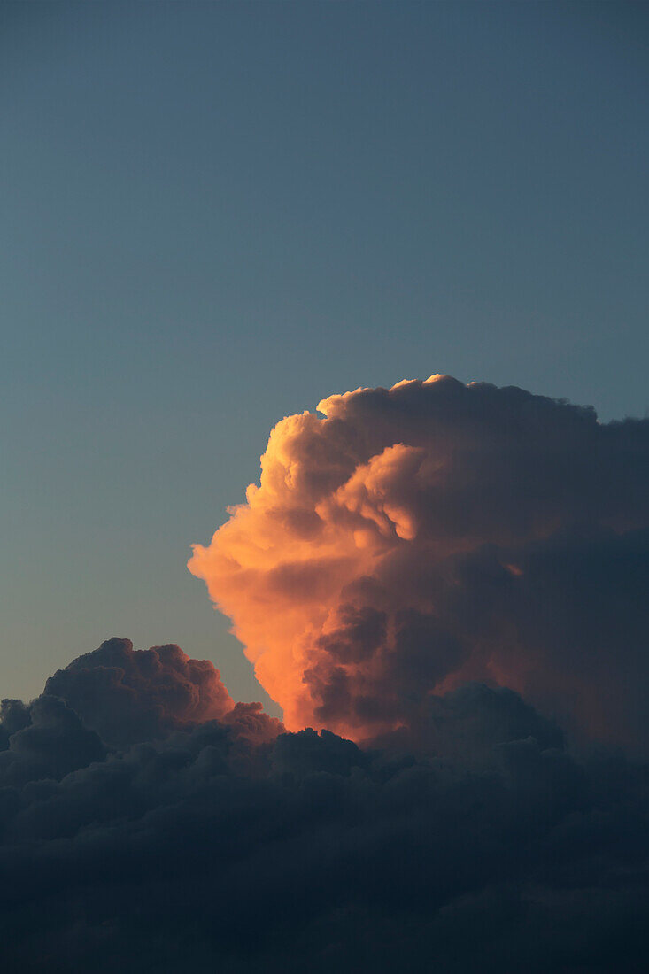 'Thunderhead forming in evening sky; Edmonton, Alberta, Canada'
