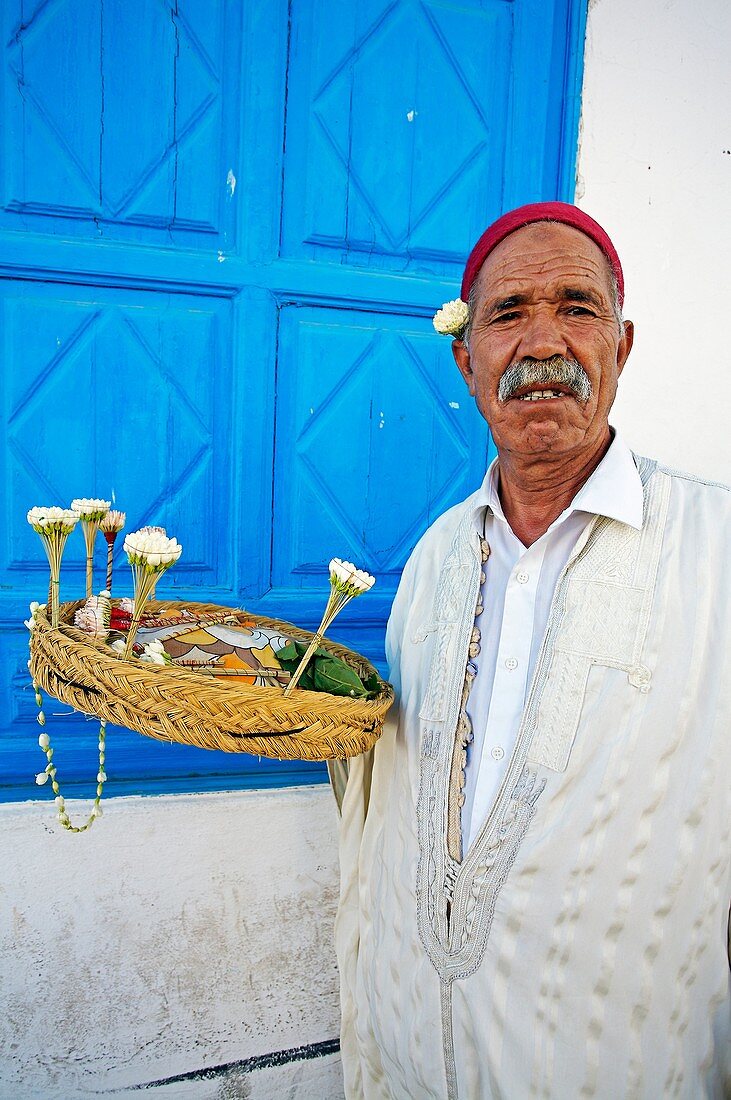Jasmine seller, village of Sidi Bou Said near Tunis  Tunisia.