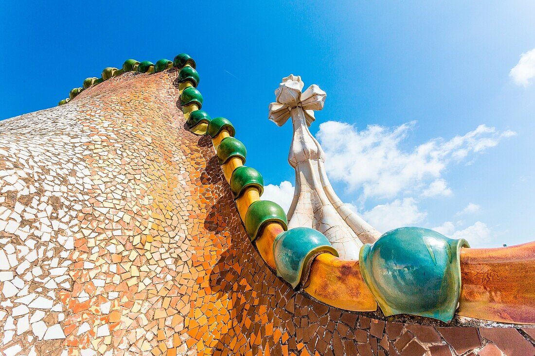 Barcelona, Spain, Casa Batlo rooftop details, chimney designed by Antonio Gaudi.