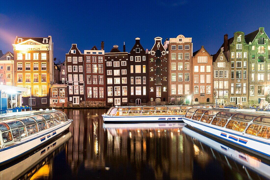 Amsterdam, houses reflecting on canal, Netherlands, Europe.