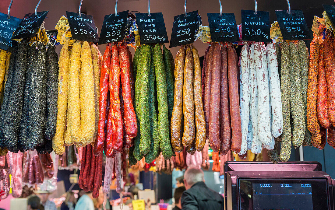 fuet - Catalan dry sausages at famous la Boqueria public market in Ciutat Vella district, Barcelona, Spain