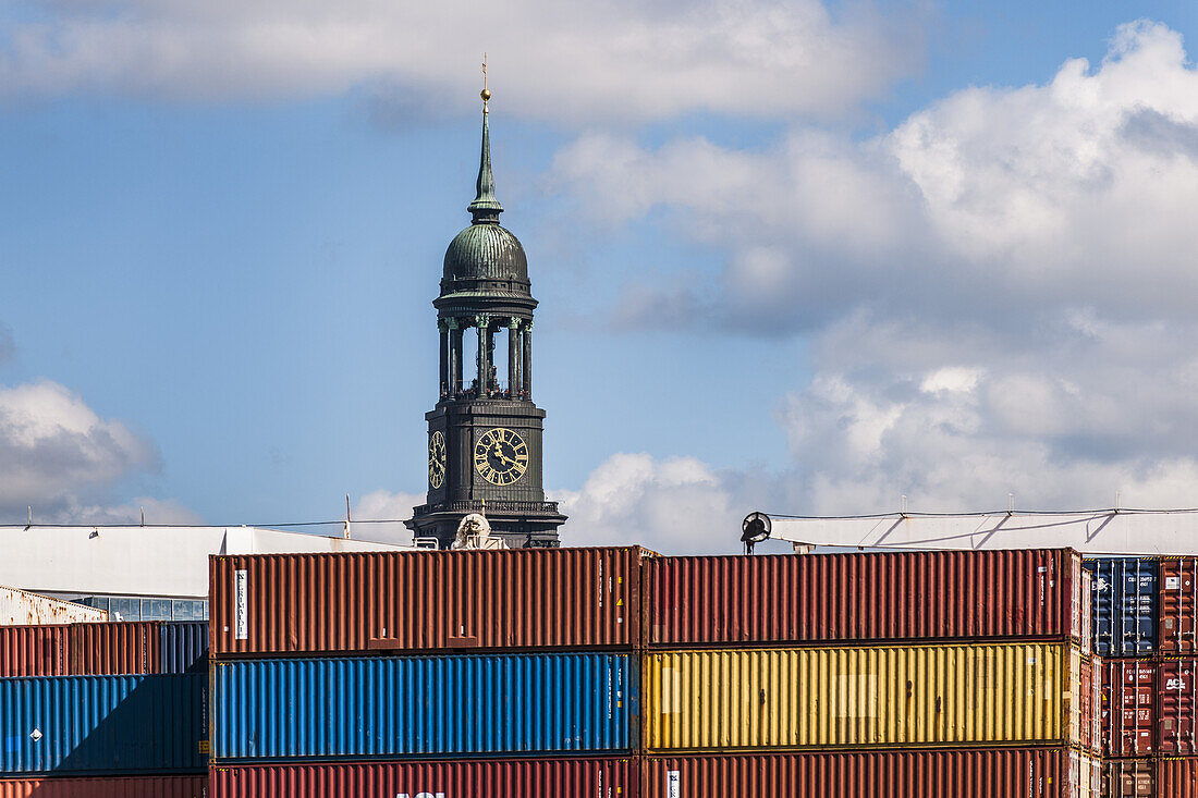 Hamburgs church of St. Michael with a containership in front, Hamburg, north Germany, Germany