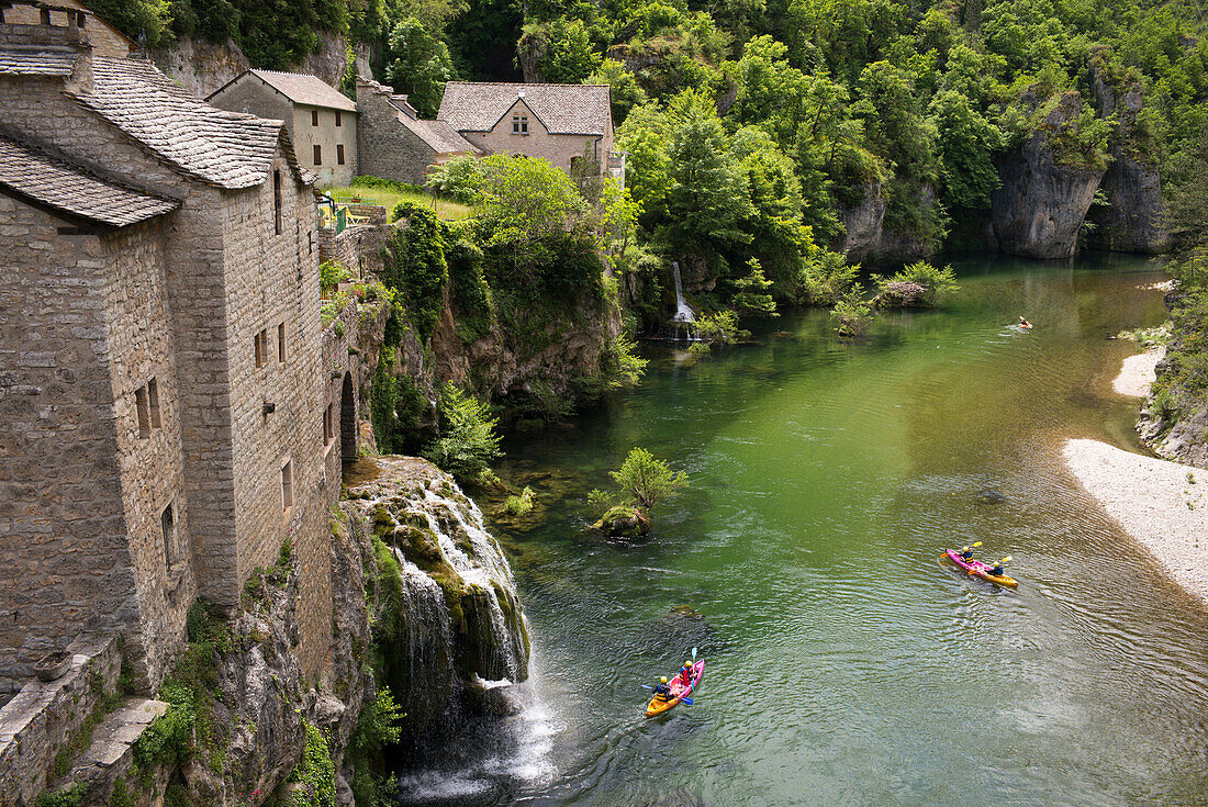 Canoeing through Saint Chély sur Tarn,  Gorges du Tarn,  Lozère,  Occitanie,  France