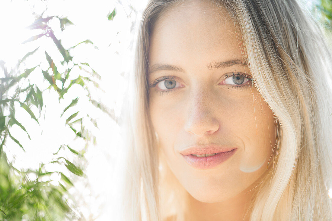 Young woman outdoors, portrait