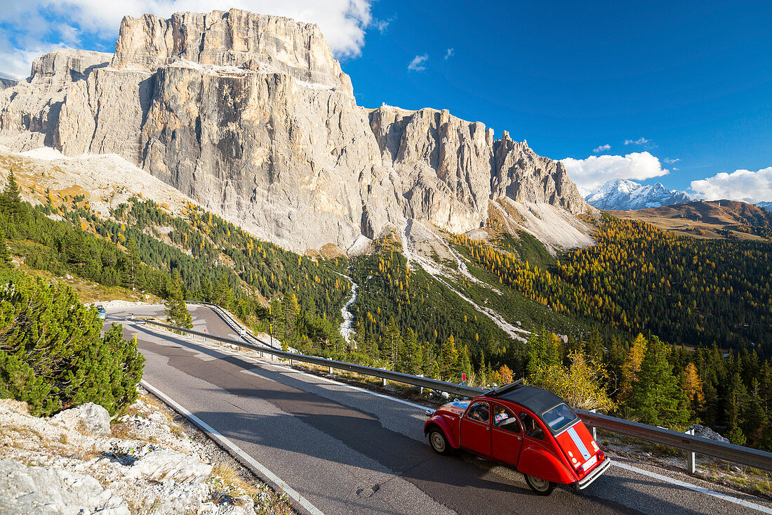 2 CV on the road from Sella Pass. Trentino Alto Adige, Italy.