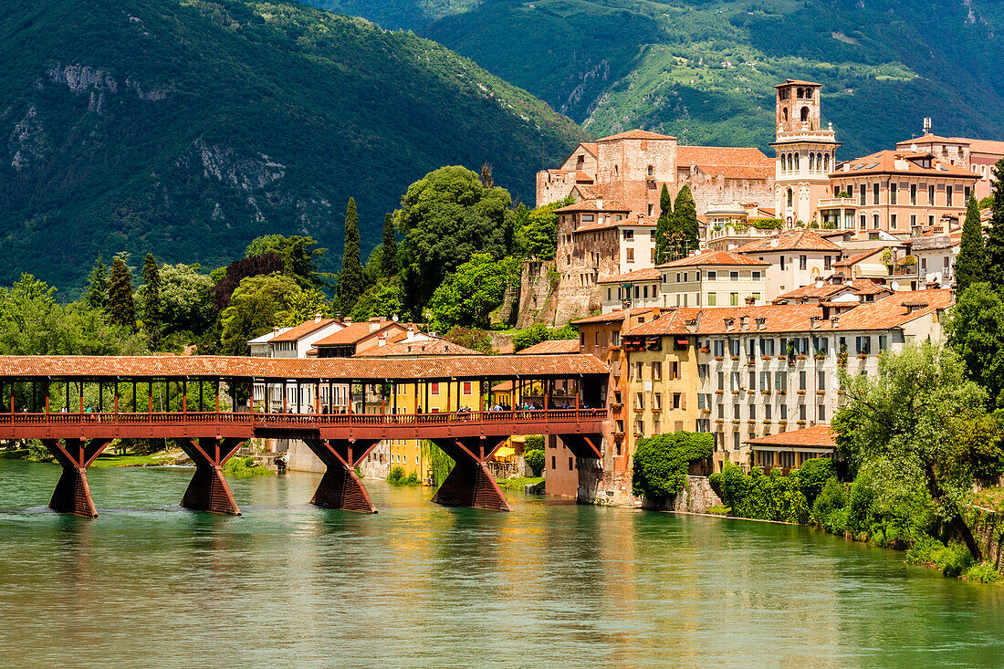 Bassano, Province of Vicenza, Veneto, Italy. Historic wooden bridge over Brenta River.