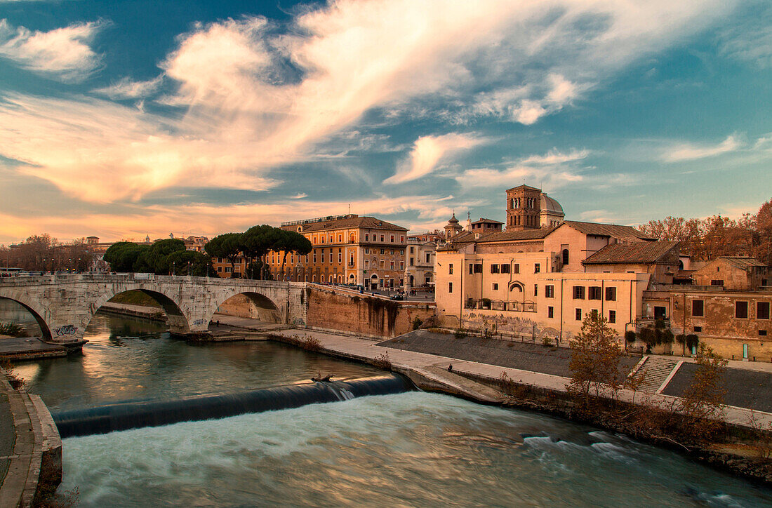 Rome, Lazio, Italy. Tiber Island at sunset