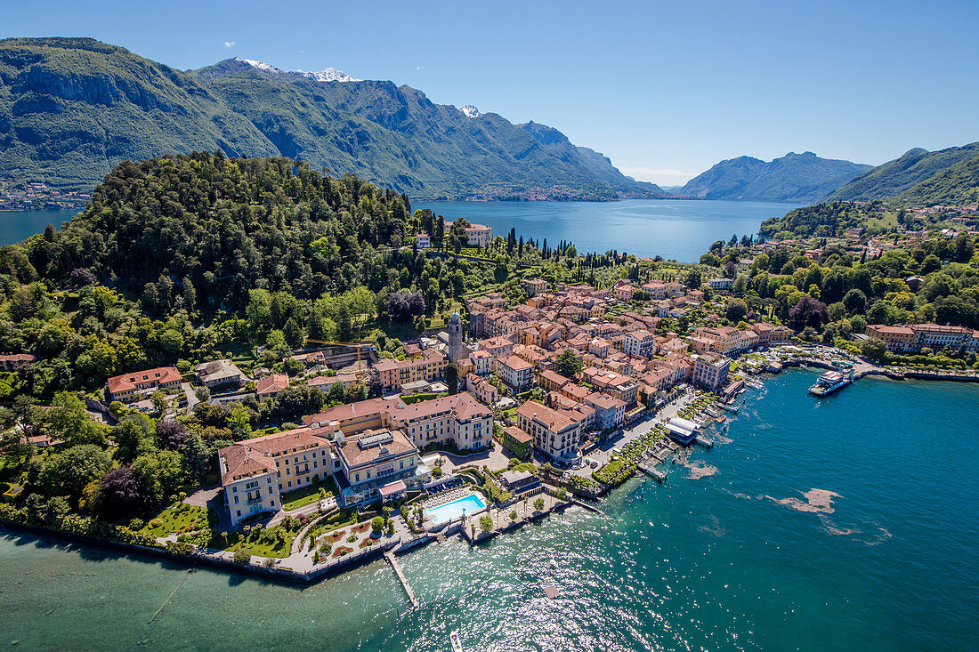 Aerial view of the turquoise waters of Lake Como and green headland that frames the village of Bellagio Italy Europe