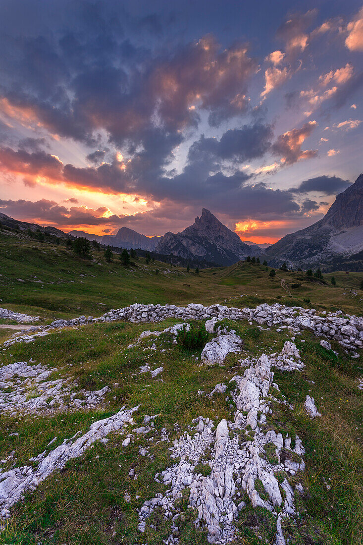 Falzarego Pass, Cortina d'Ampezzo, Veneto, Italy. Clouds and light over the Sass de Stria during a beautiful sunset.