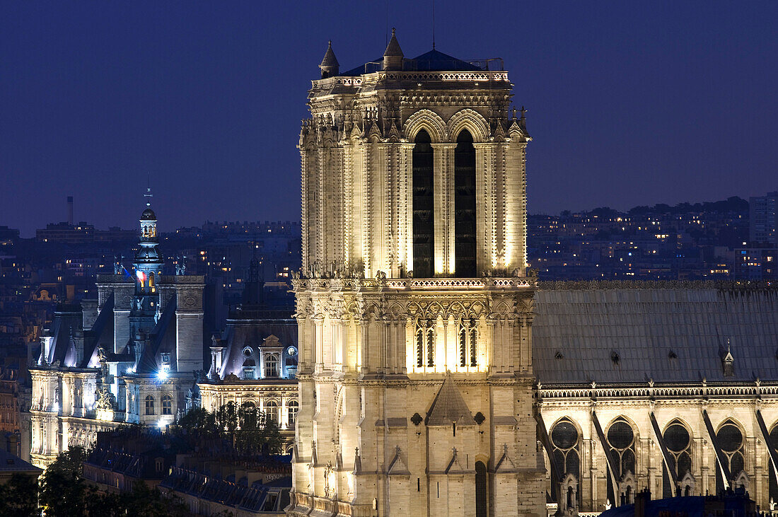 France, Paris, area listed as World Heritage by UNESCO, Notre Dame Cathedral and the Hotel de Ville (city hall) on the left illuminated