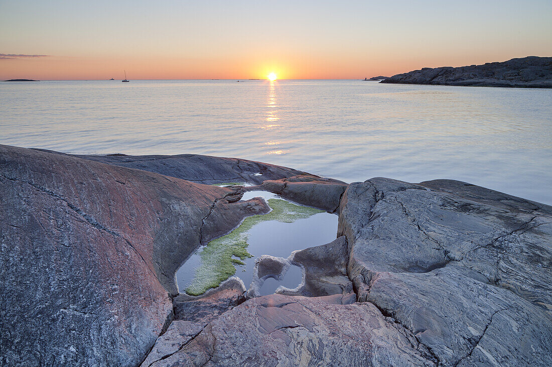 Rocky coast with sunset, Isle Hoenoe, Bohuslaen, Vaestra Goetaland County, Archipelago of Gothenburg, Scandinavia, South Sweden, Sweden, Northern Europe
