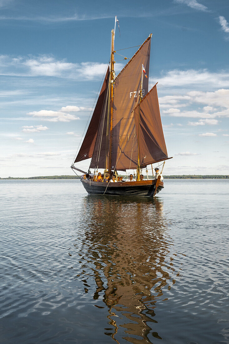 A Zeesenboot, or Zeesboot sails on the Bodden in Dierhagen. Dierhagen, Darß, Mecklenburg-Vorpommern, Germany