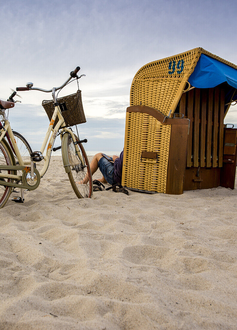 Bicycles are in Dierhagen on the Baltic Sea beach. Dierhagen, Darß, Mecklenburg-Vorpommern, Germany