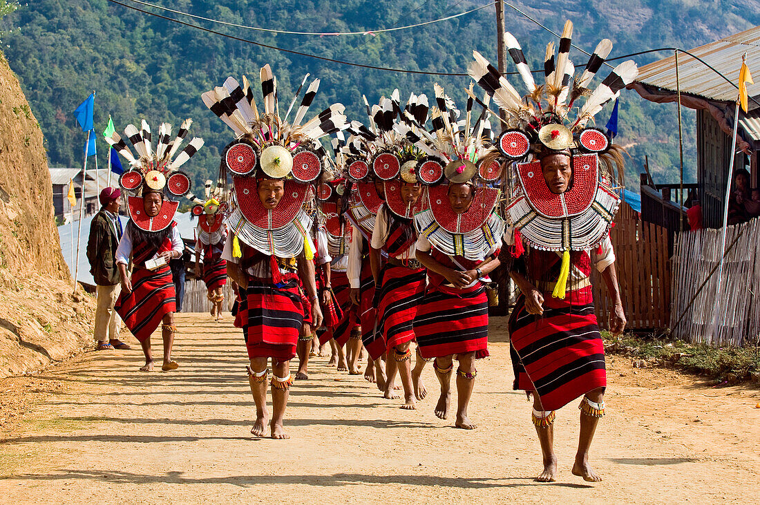 Myanmar (Burma), Sagaing Division, Leshi village, Nagas of Tenkul tribe adorned heading to the dance field
