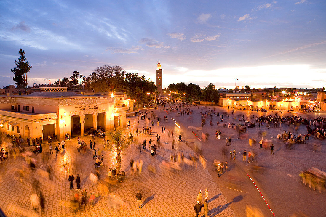 Morocco, Haut Atlas, Marrakesh, Imperial city, Medina listed as World Heritage by UNESCO, sunset over Jemaa El Fna square
