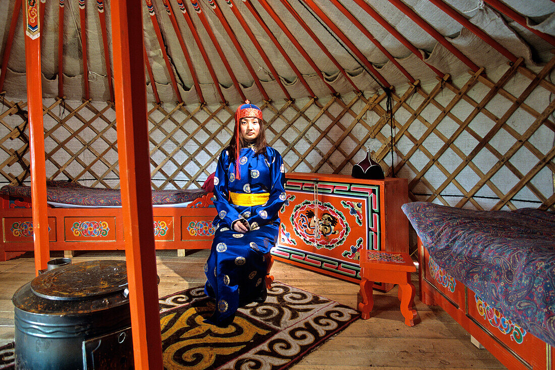 France, Lozere, Aumont Aubrac, a young Mongolian woman welcomes you and makes you discover the Mongolian customs